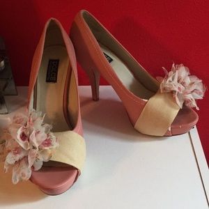 Pink heels with flowers on front